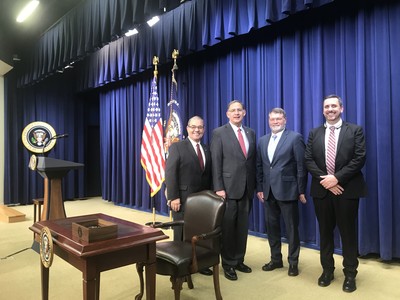 Veach and delegation before the ceremony